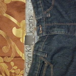 Womens Calvin Klein jeans blue in color flare leg new not used